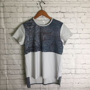 • NWOT Lululemon Athletica Hi Low Top •